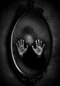 mirror with hands for childhood trauma post
